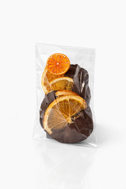 Dried orange slices half-covered in Ecuadorian dark chocolate